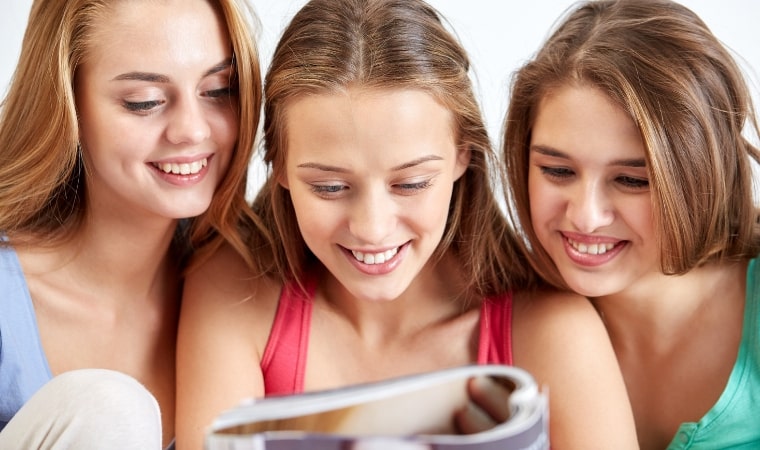 teenage girls reading sex education books