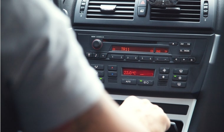 man in car radio