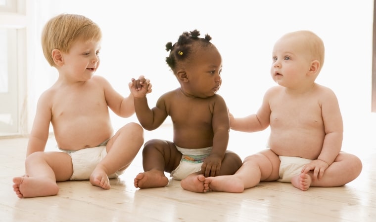 3 cute babies in nappies