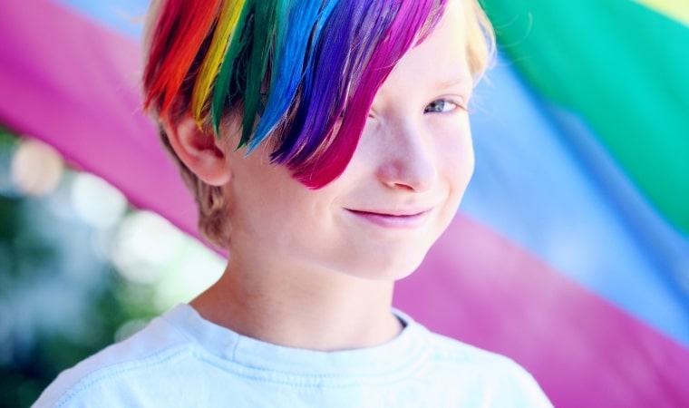 child with rainbow hair