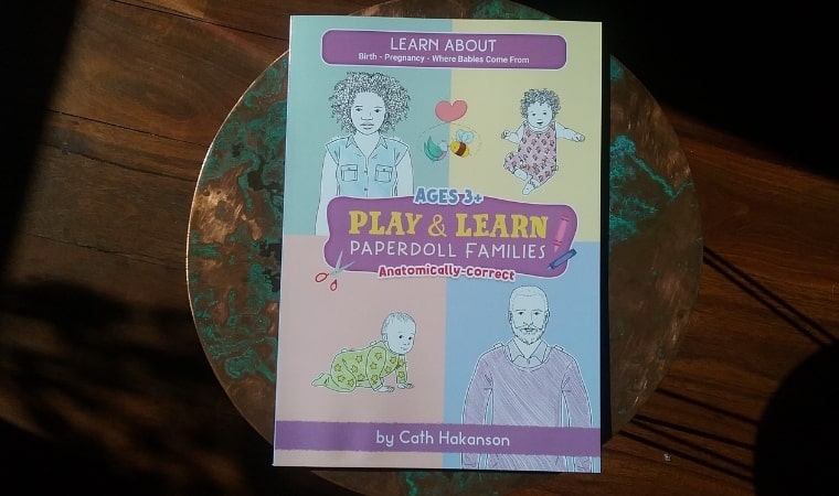 cover of play and learn paperdoll families by cath hakanson