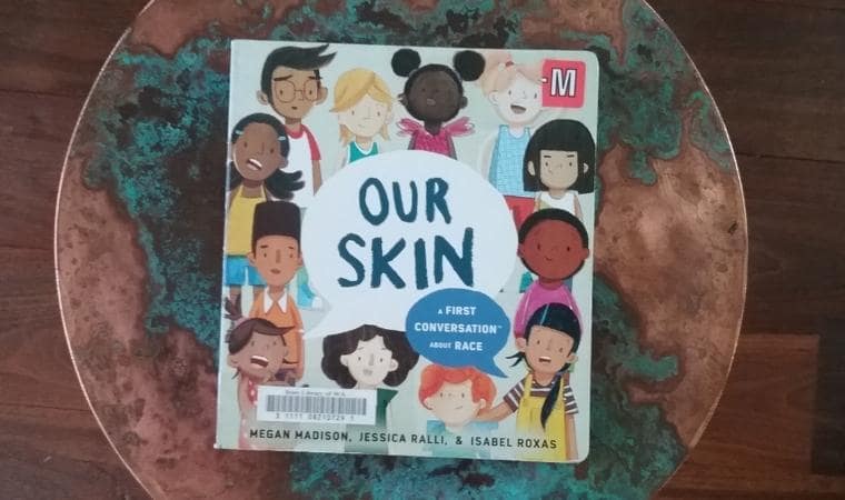 cover of Our Skin. A first conversation about race by Megan Madison