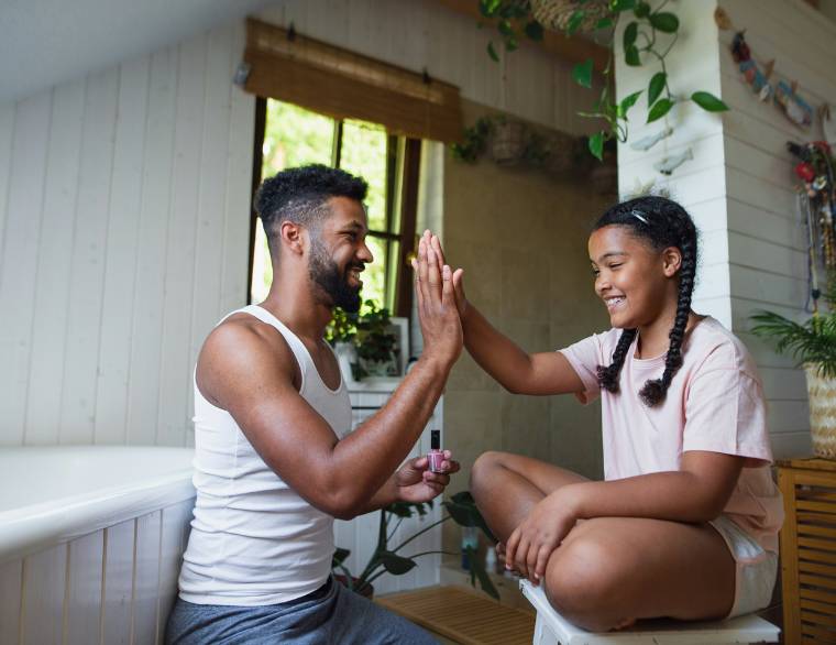 parent and tween high fiving each other as the pornography quiz says they are ready