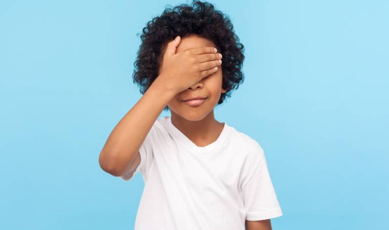 child covering eyes on seeing their parent naked or nude